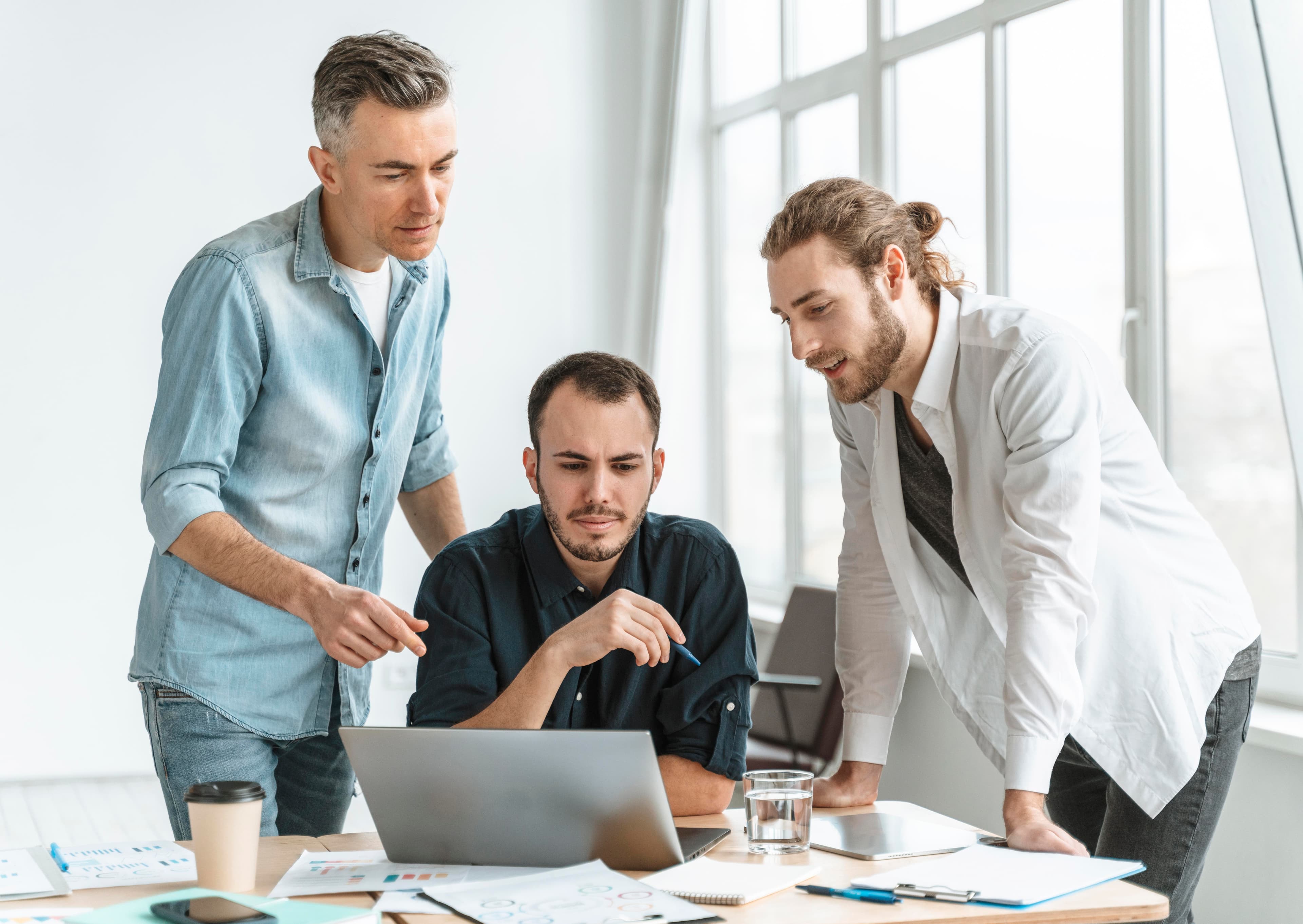 Nexora team collaborating in an Abu Dhabi office